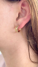 Load image into Gallery viewer, Model wearing Scalloped 6mm Old English Hoop Earrings in 14K Yellow Gold
