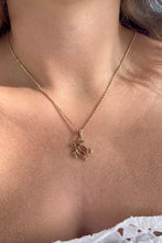 Load image into Gallery viewer, Model wearing Petroglyph Turtle Pendant
