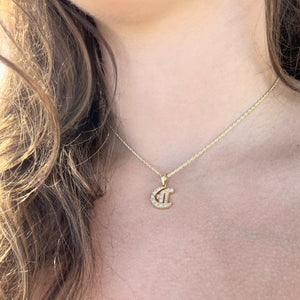 Model wearing Hawaiian Diamond Initial C Pendant in 14K Yellow Gold 